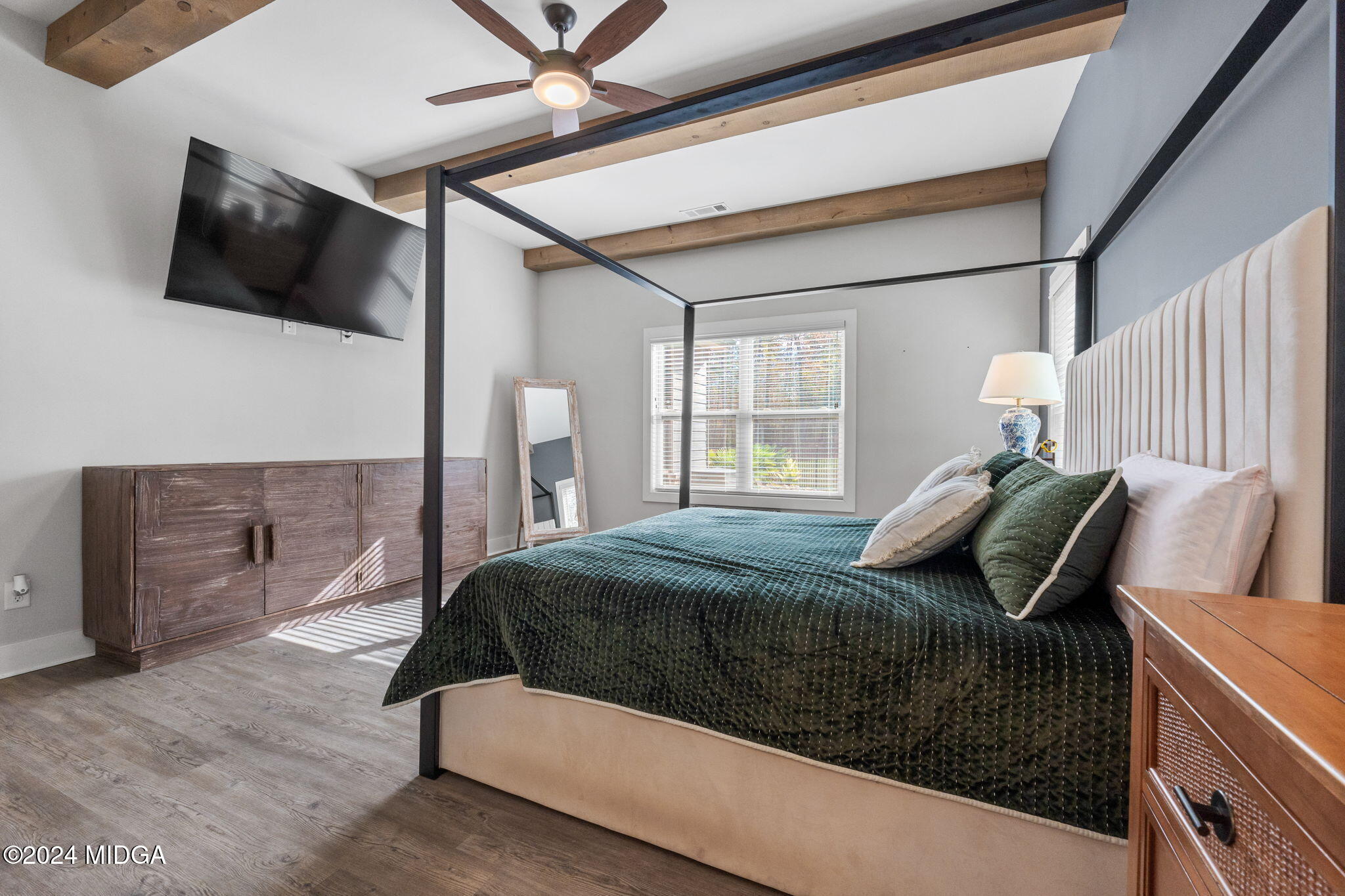 131 Belmont Way Forsyth, GA 31029 - Photo 24 of 68 a bedroom with a bed and flat screen tv