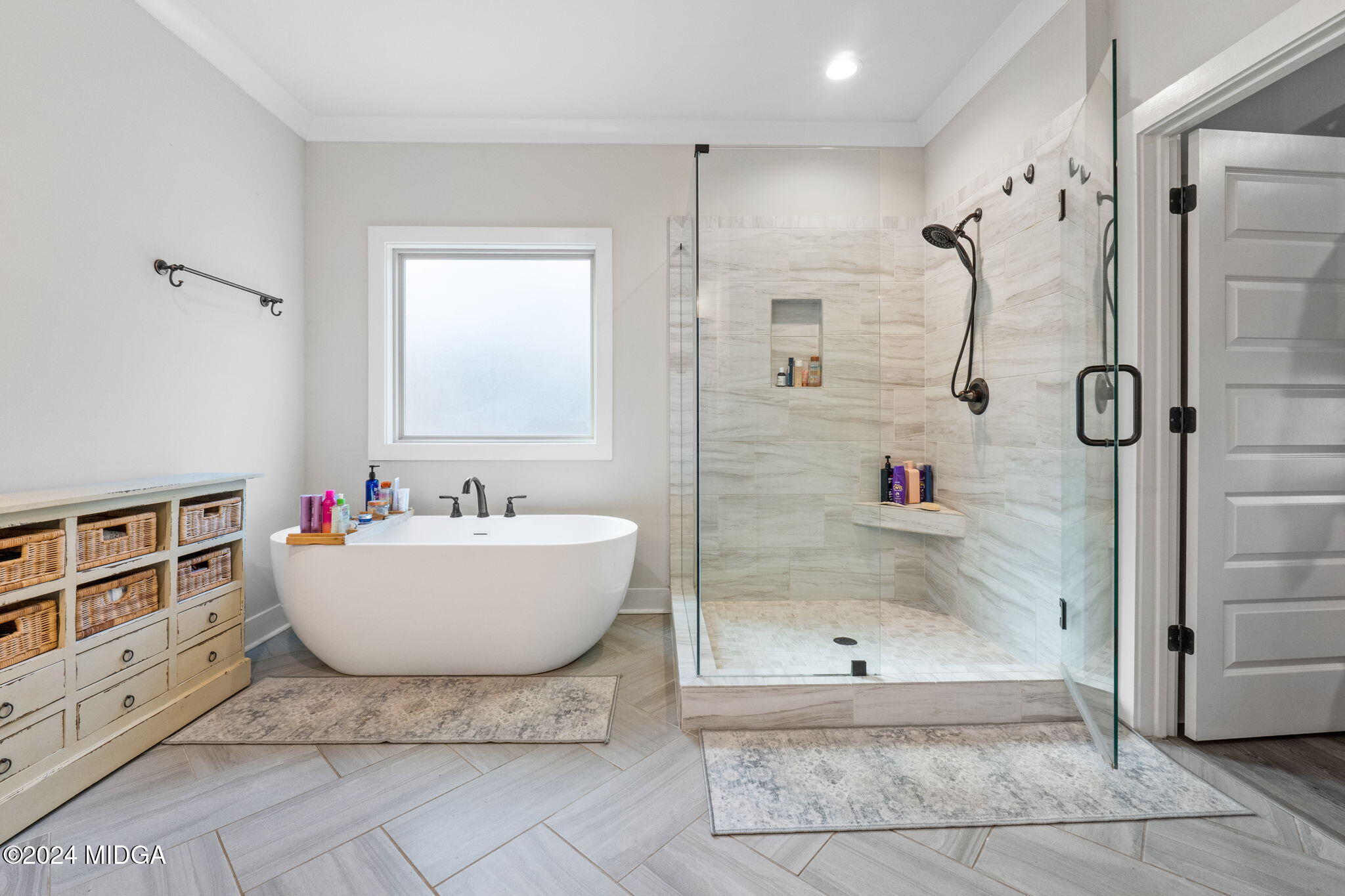 131 Belmont Way Forsyth, GA 31029 - Photo 27 of 68 a bathroom with a bathtub and a shower