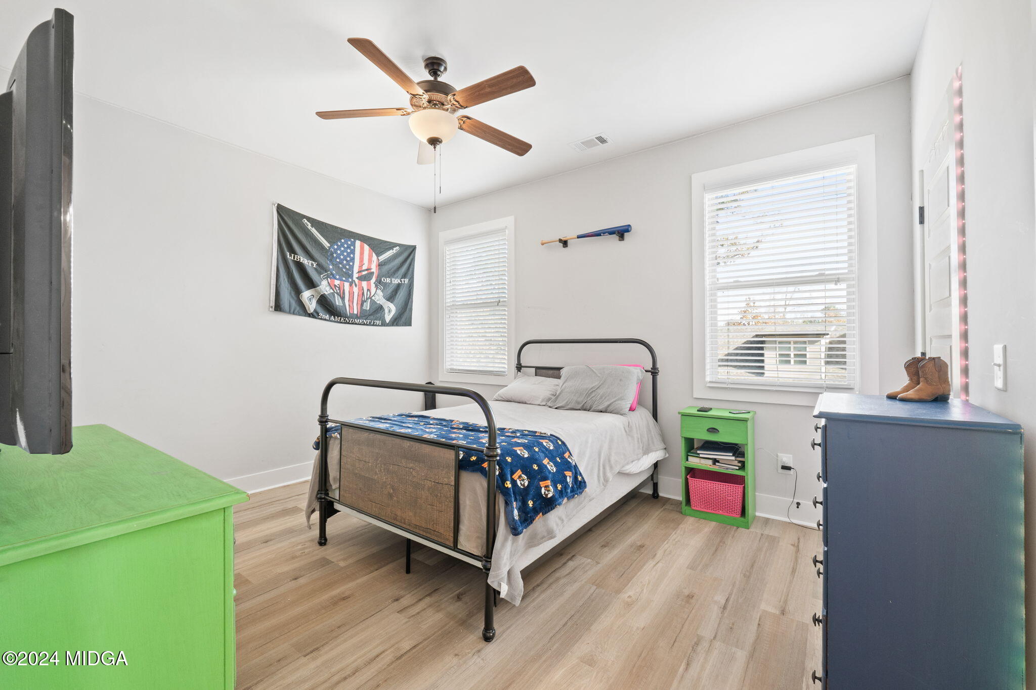 131 Belmont Way Forsyth, GA 31029 - Photo 32 of 68 a bedroom with a bed and a window