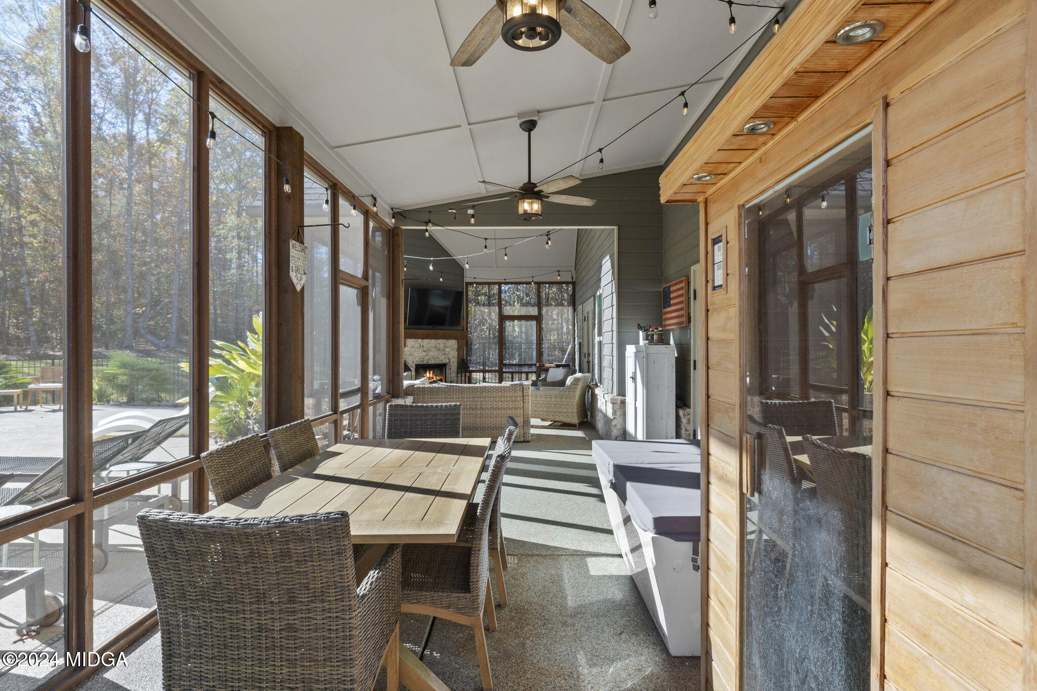 131 Belmont Way Forsyth, GA 31029 - Photo 42 of 68 a view of a dining room with furniture large windows and wooden floor