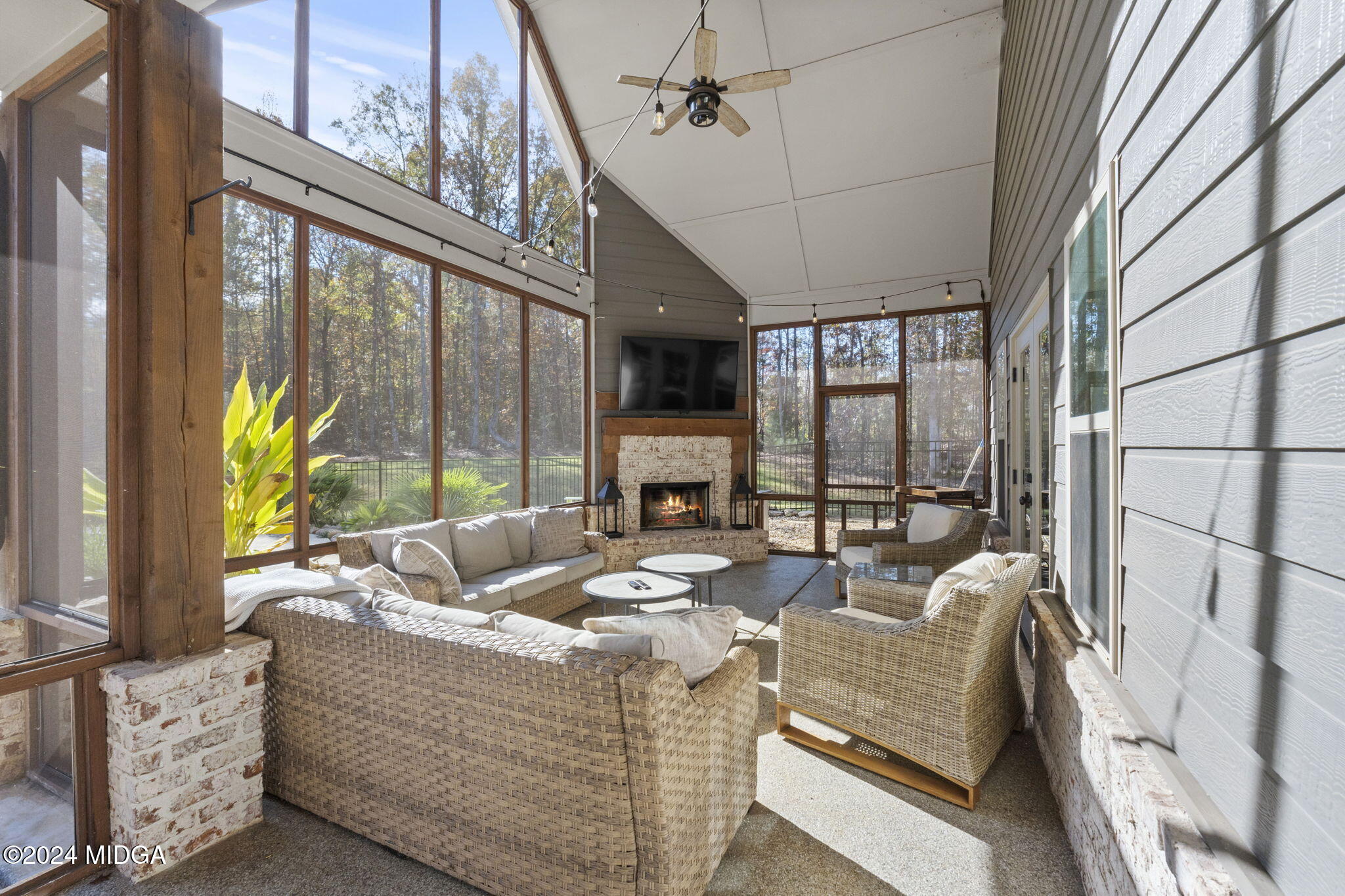 131 Belmont Way Forsyth, GA 31029 - Photo 45 of 68 a living room with fireplace furniture and a large window