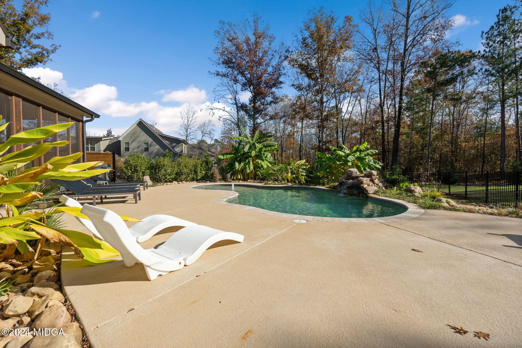 131 Belmont Way Forsyth, GA 31029 - Photo 48 of 68 a view of a swimming pool with a patio