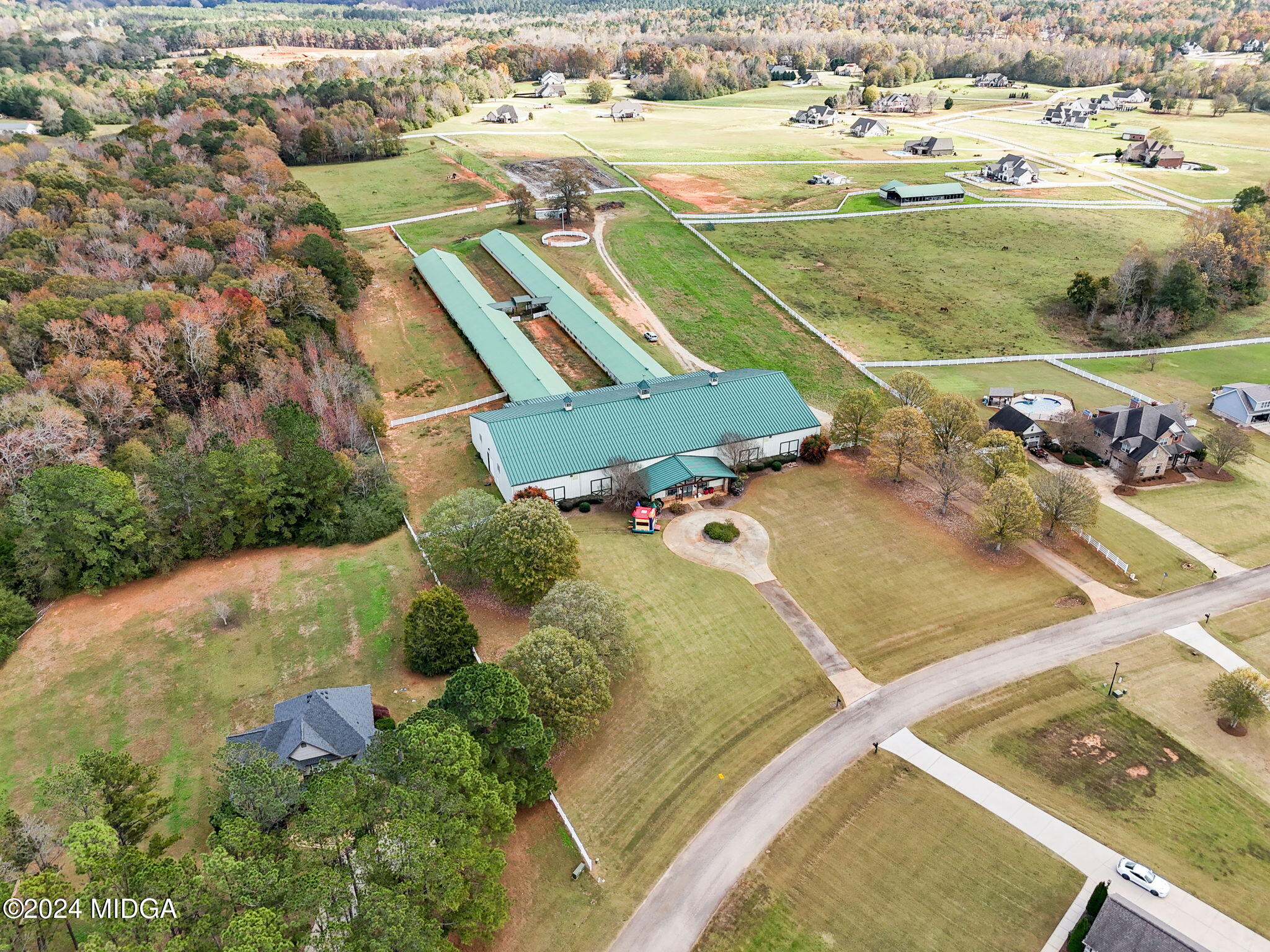 131 Belmont Way Forsyth, GA 31029 - Photo 64 of 68 an aerial view of a house with a yard