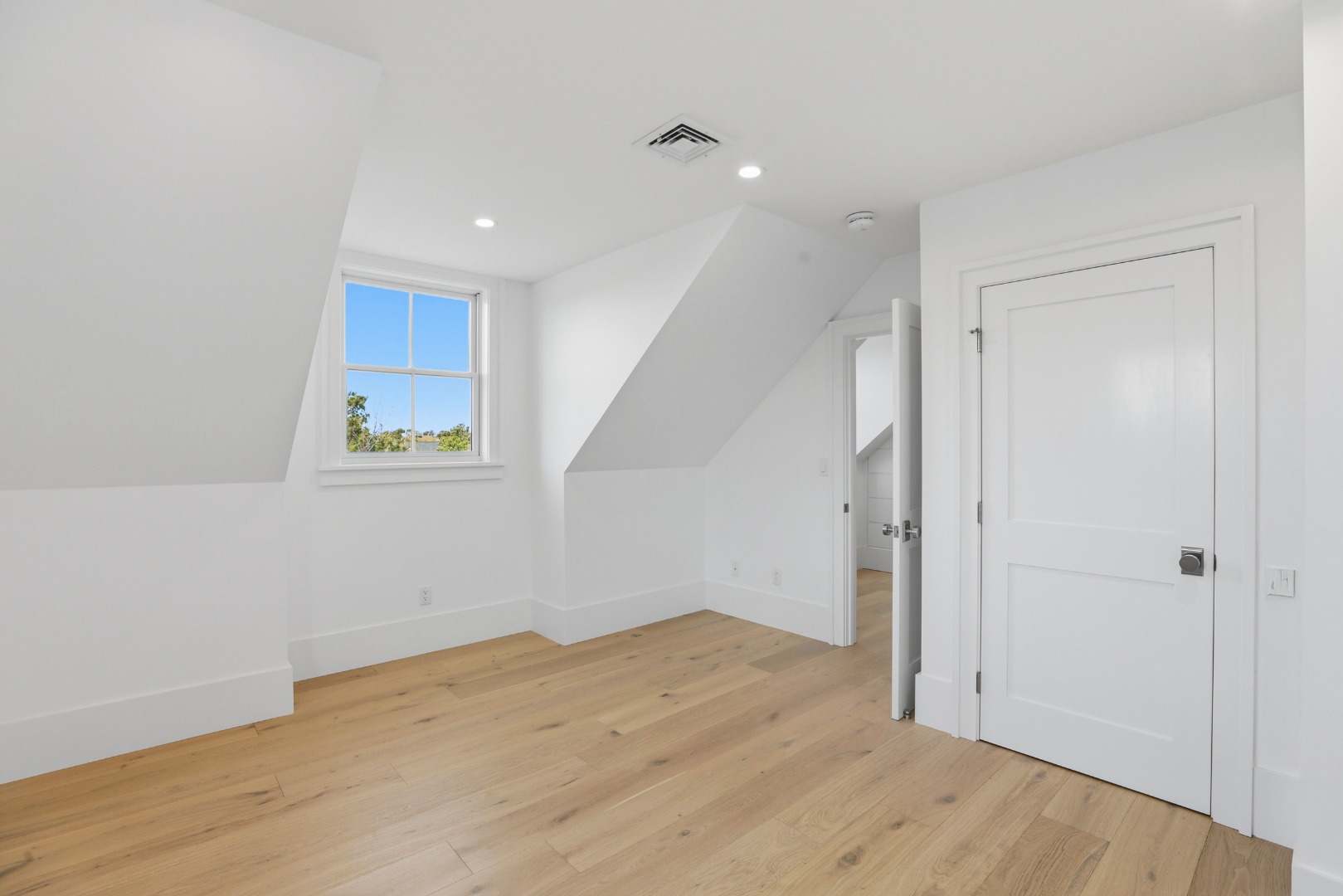 10 Rudder Lane Nantucket, MA 02554 - Photo 25 of 33 wooden floor in an empty room with a window