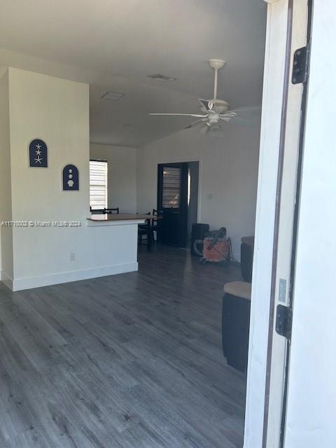 74 Pelican Lane, Unit 1 Big Pine Key, FL 33043 - Photo 14 of 23 wooden floor in an empty room with a window