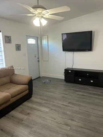 a kitchen with cabinets stainless steel appliances and a counter space