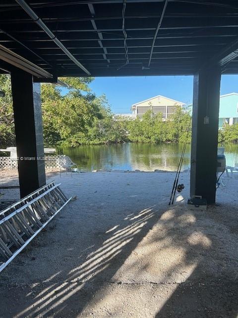 74 Pelican Lane, Unit 1 Big Pine Key, FL 33043 - Photo 9 of 23 a view of a floor to ceiling window with lake view