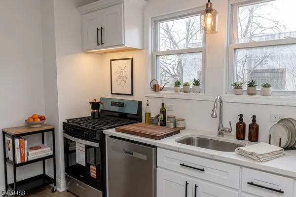 a view of a workspace with furniture