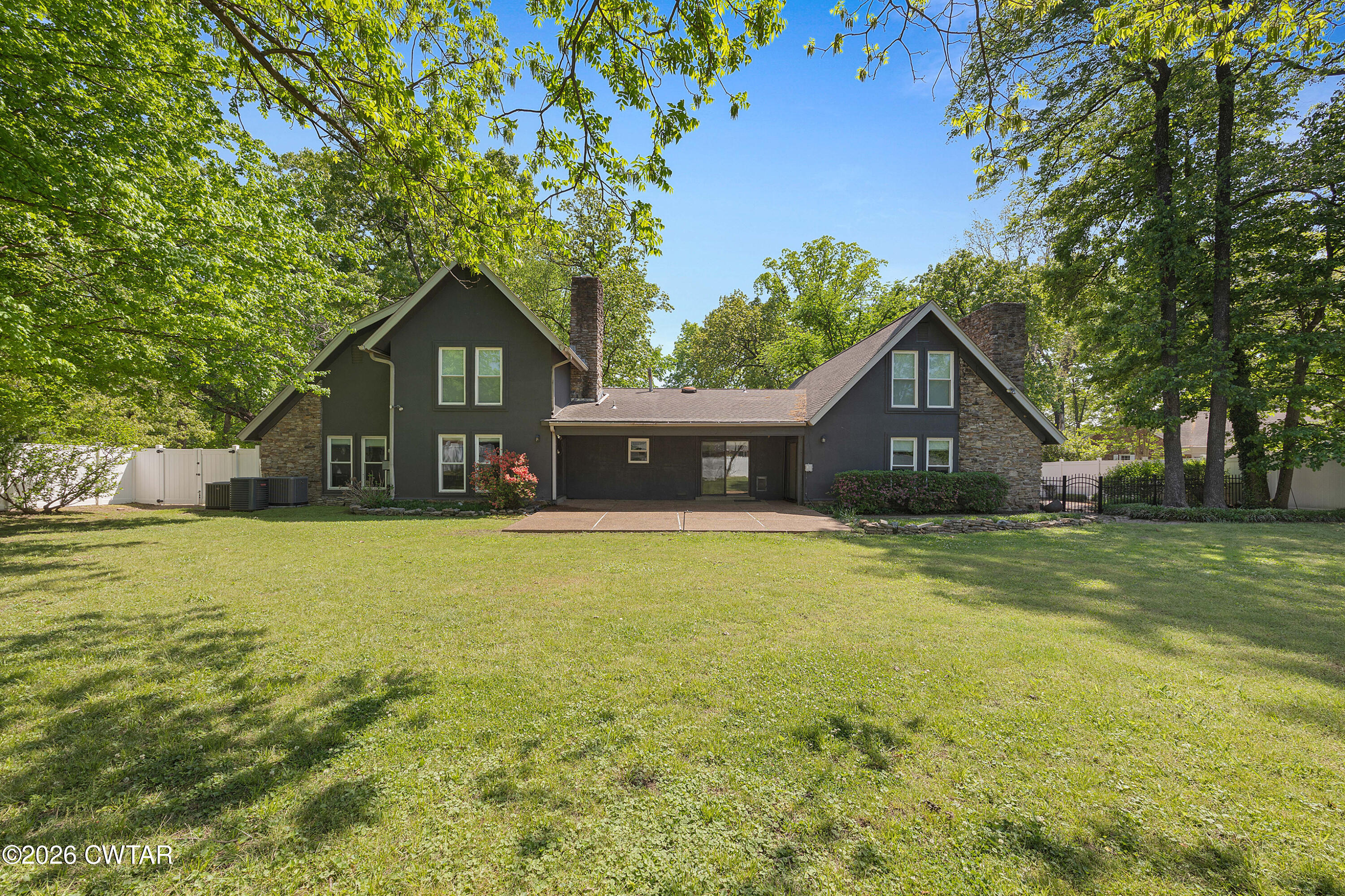 75 Old Humboldt Road Jackson, TN 38305 - Photo 2 of 33 a front view of a house with a yard