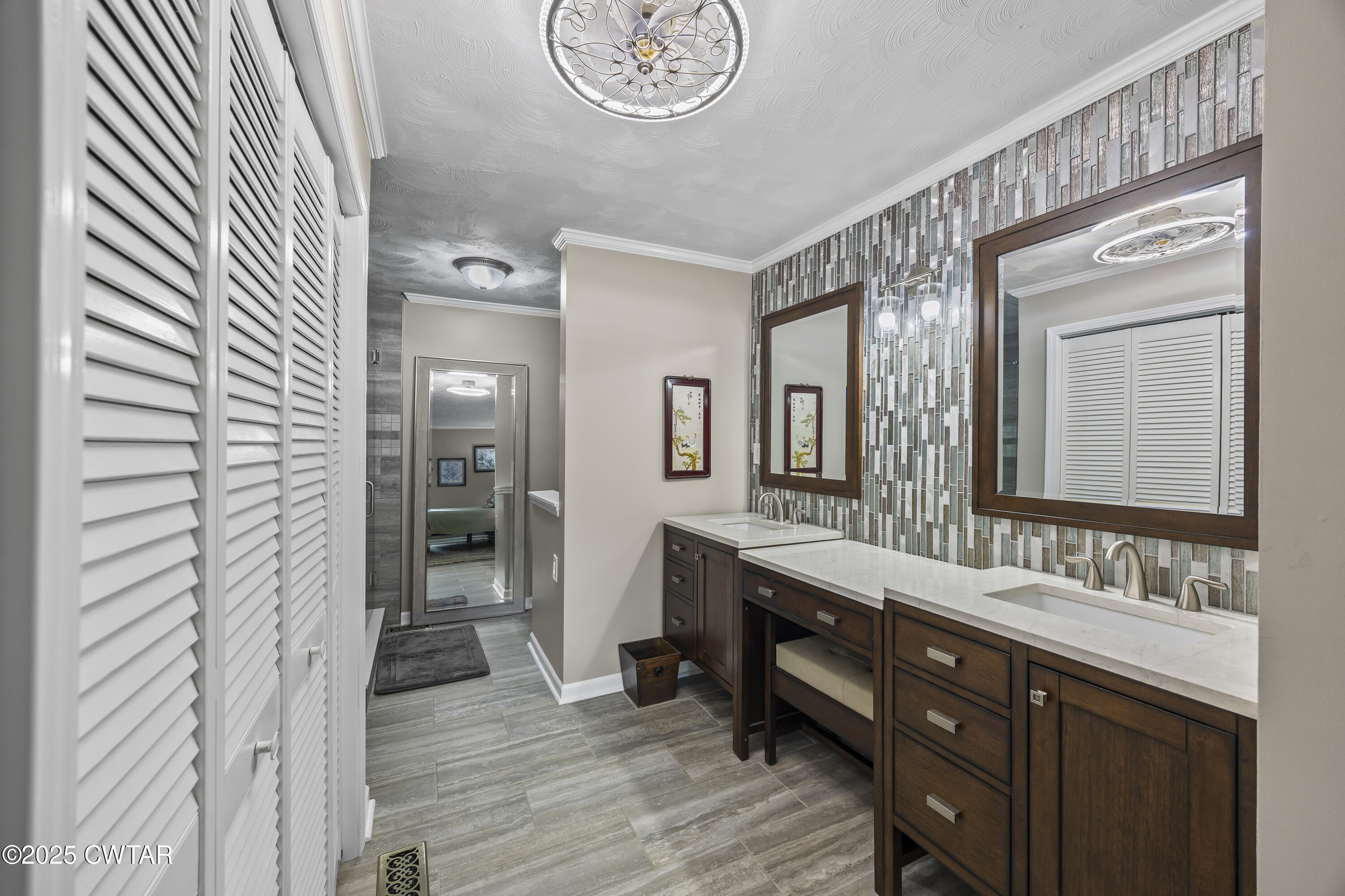 75 Old Humboldt Road Jackson, TN 38305 - Photo 23 of 33 a bathroom with a double vanity sink and a mirror
