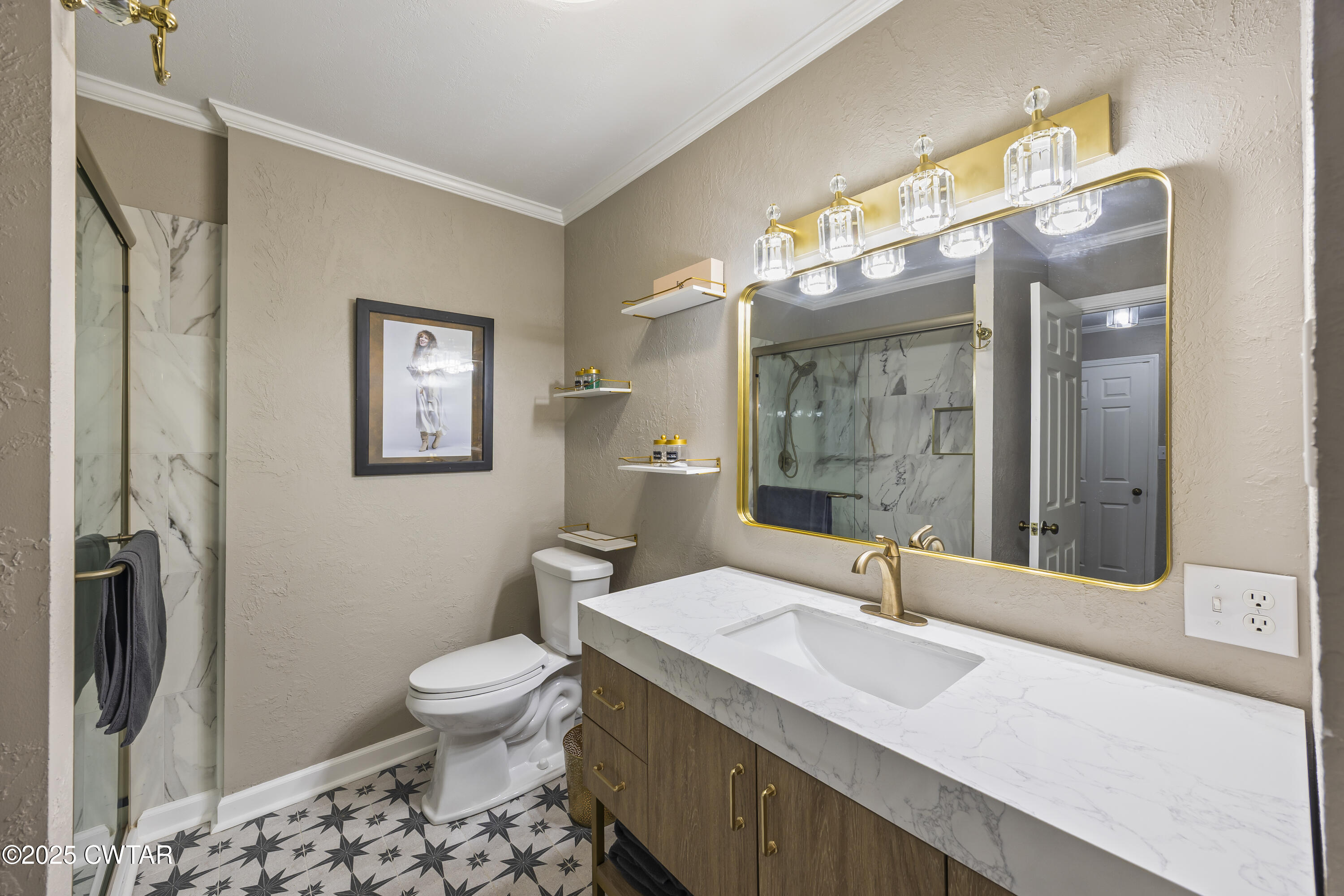 75 Old Humboldt Road Jackson, TN 38305 - Photo 27 of 33 a bathroom with a sink a toilet a mirror and shower