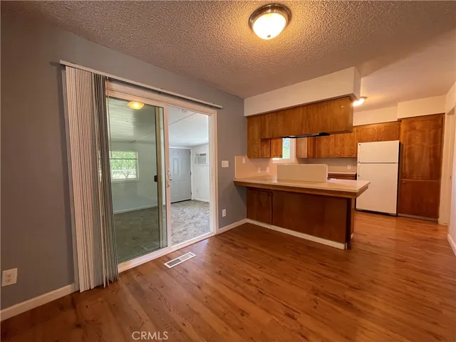 a room with a door open to a room