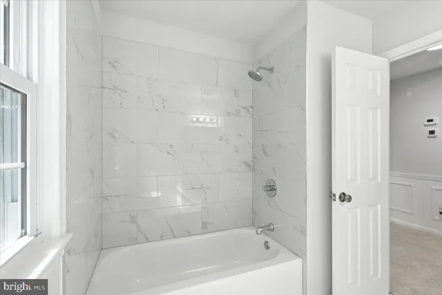 a bathroom with a bathtub