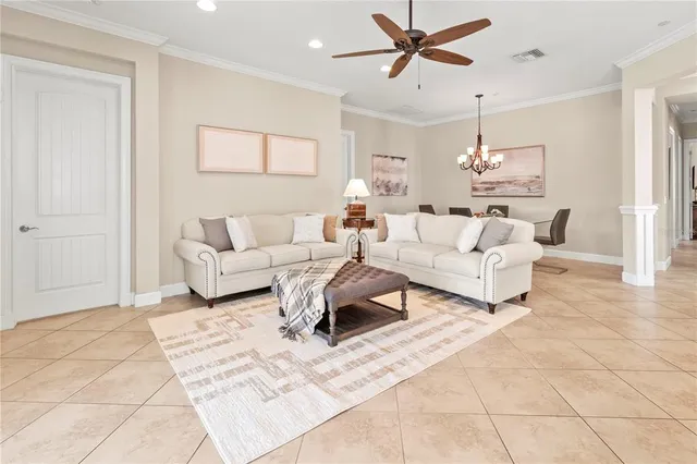 a kitchen with stainless steel appliances granite countertop a stove a sink a microwave and a refrigerator