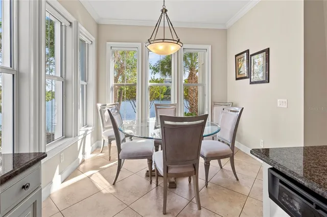 a spacious bathroom with a double vanity sink mirror and bathtub