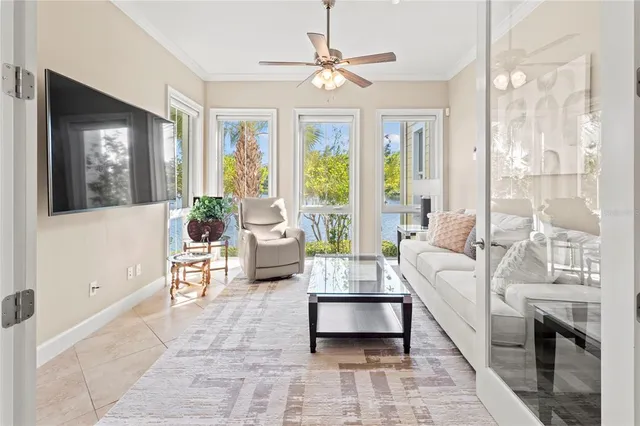 a bedroom with a bed and a table with wooden floor