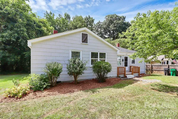 a house view with a garden space