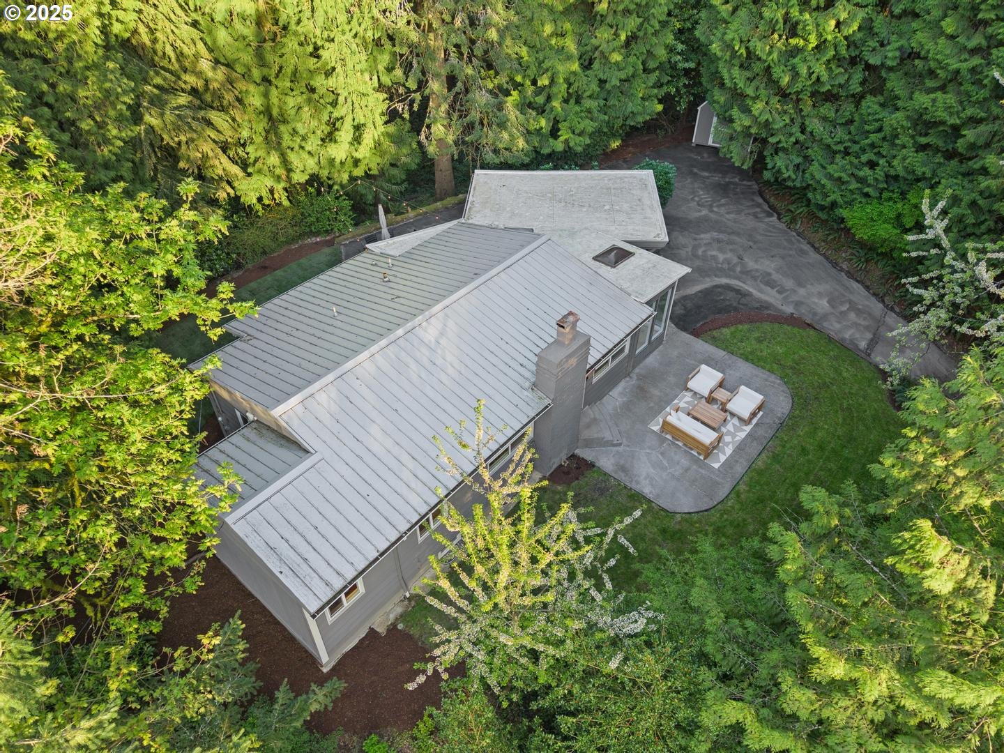 4200 West Burnside Road Portland, OR 97210 - Photo 32 of 36 an aerial view of a house with a yard