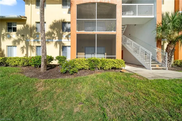 a view of a building with a garden
