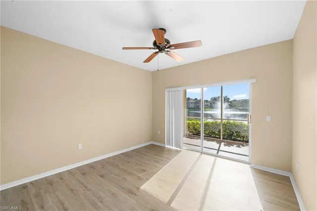 a view of a room with a large window