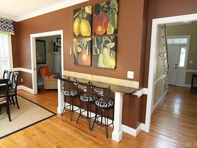1909 Capers Court Raleigh, NC 27612 - Photo 6 of 15 How about this, a great eating area for the kids at breakfast! Notice the gorgeous hardwoods! Kitchen