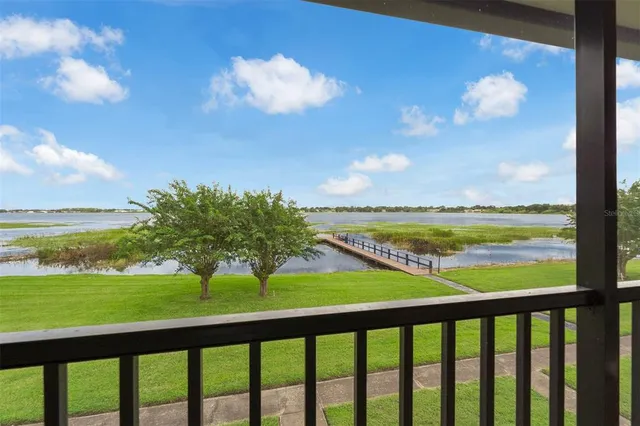 a bathroom with a toilet a sink and a mirror