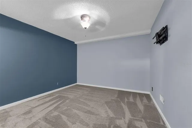 a view of an house with backyard space and porch