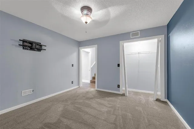 a view of a house with backyard