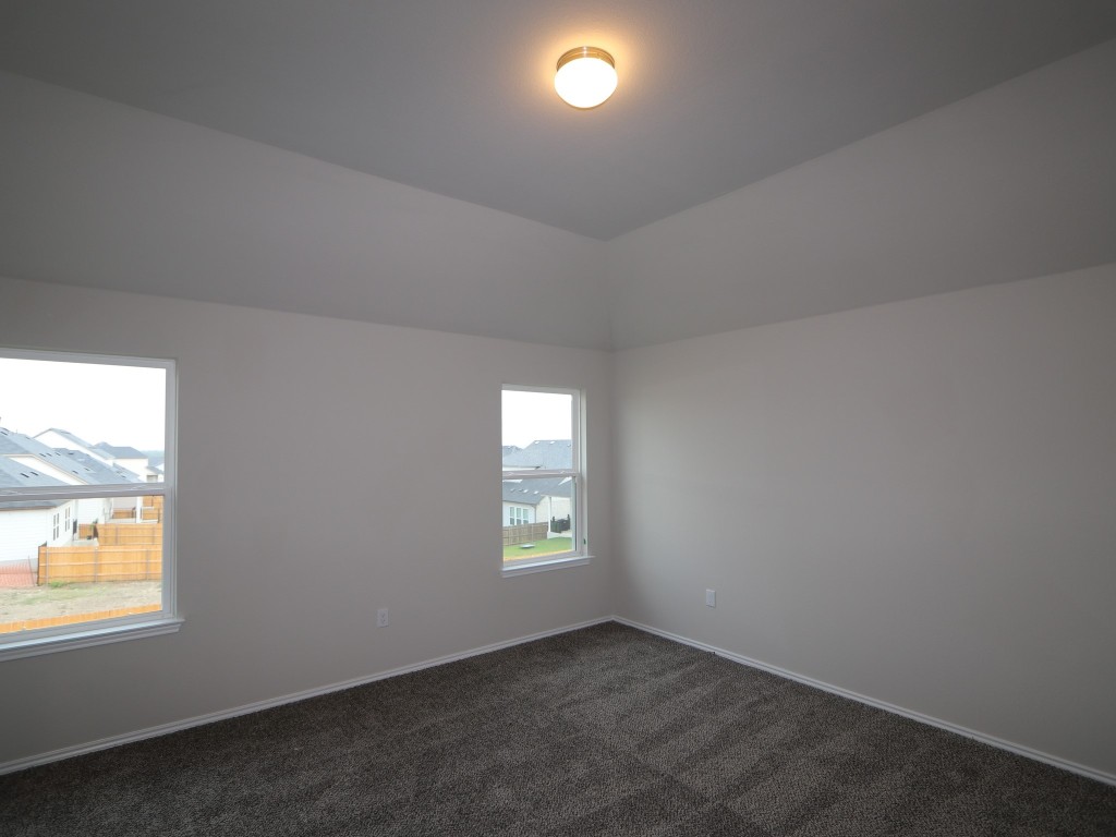 4504 Beacon Bay Drive Austin, TX 78747 - Photo 11 of 31 an empty room that has a window