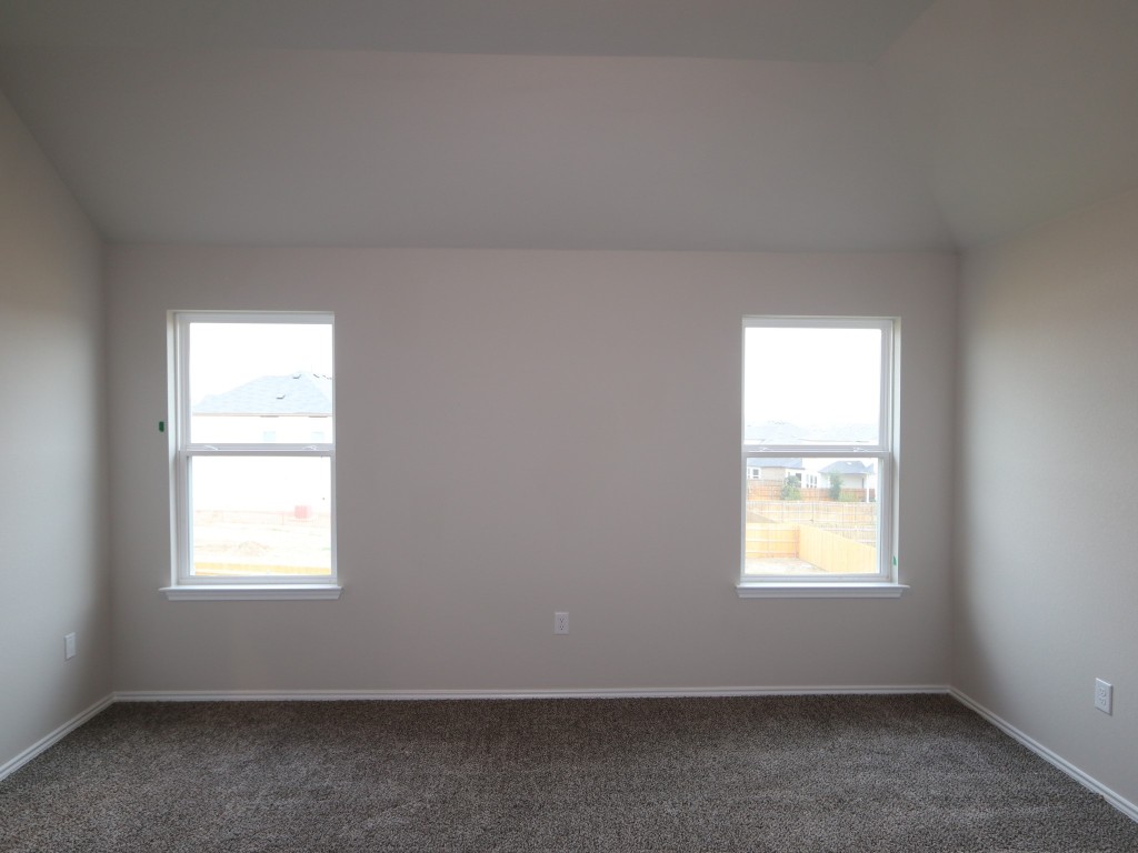 4504 Beacon Bay Drive Austin, TX 78747 - Photo 12 of 31 an empty room with a window