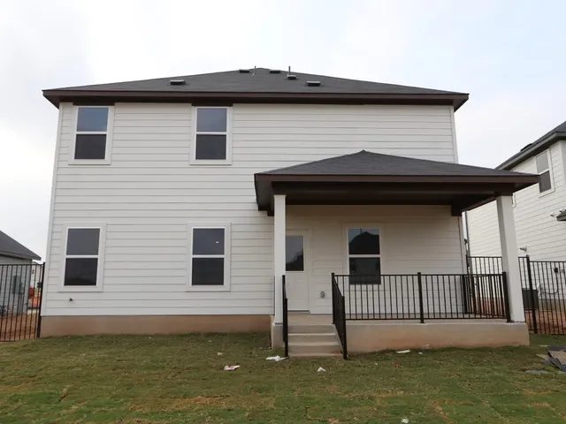 a house view with a garden space