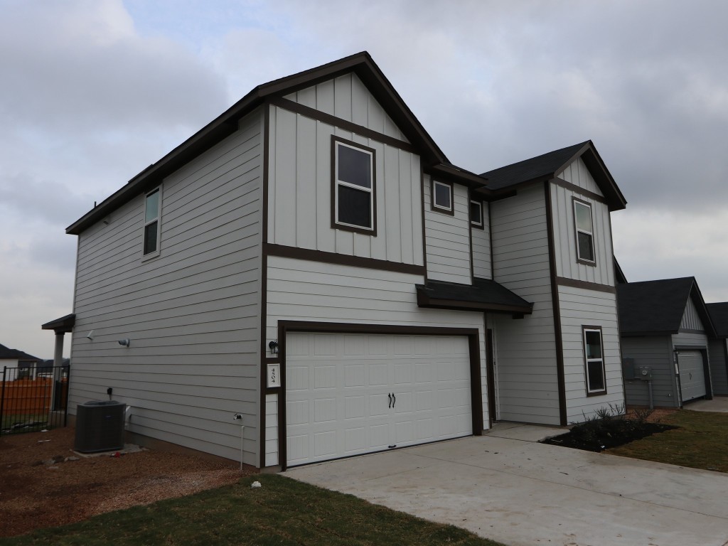 4504 Beacon Bay Drive Austin, TX 78747 - Photo 2 of 31 a house view with a outdoor space
