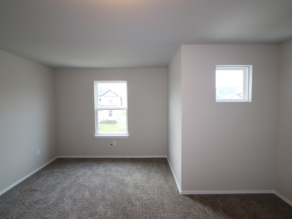 4504 Beacon Bay Drive Austin, TX 78747 - Photo 10 of 31 an empty room with window