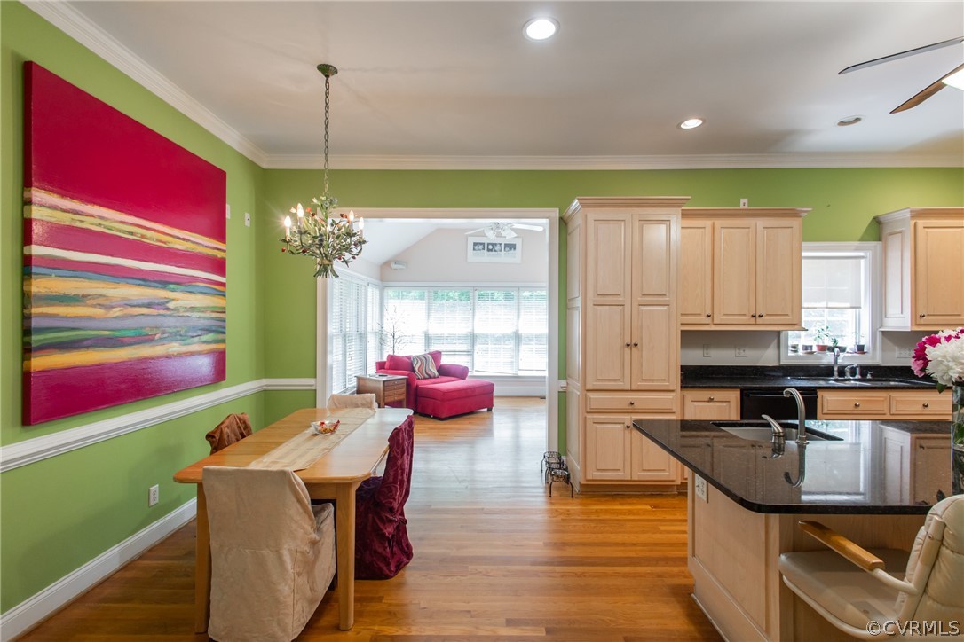 369 Hamlet Road Manakin-Sabot, VA 23103 - Photo 11 of 50 a kitchen with a sink a stove and a wooden floors