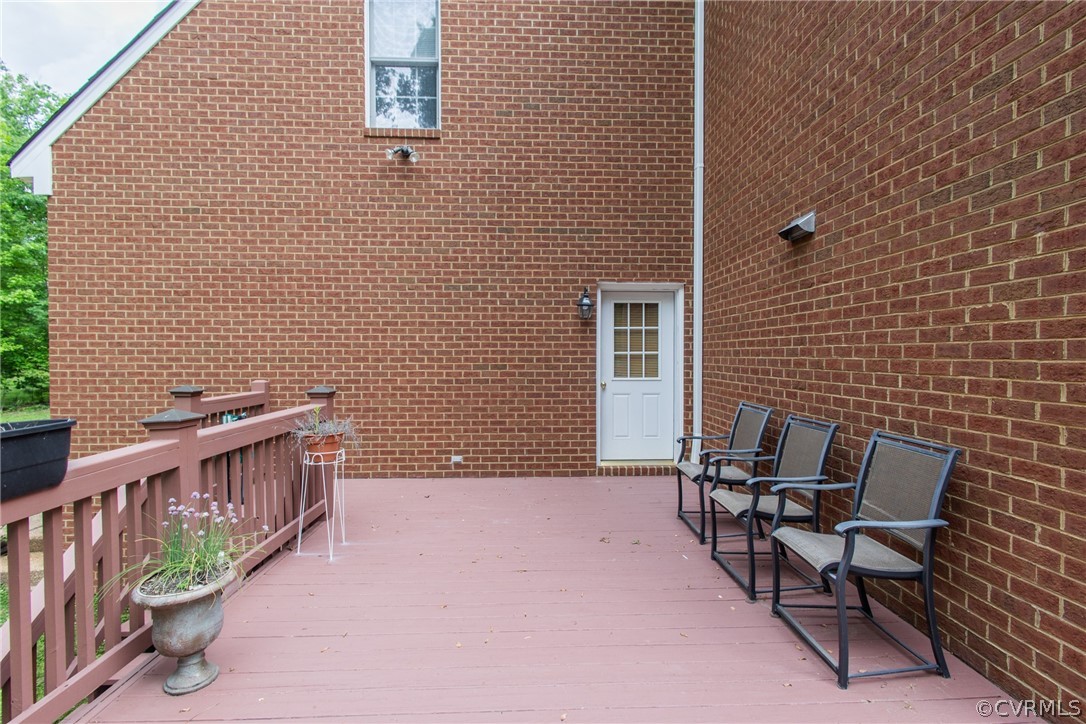 369 Hamlet Road Manakin-Sabot, VA 23103 - Photo 18 of 50 a balcony with chairs and wooden floor