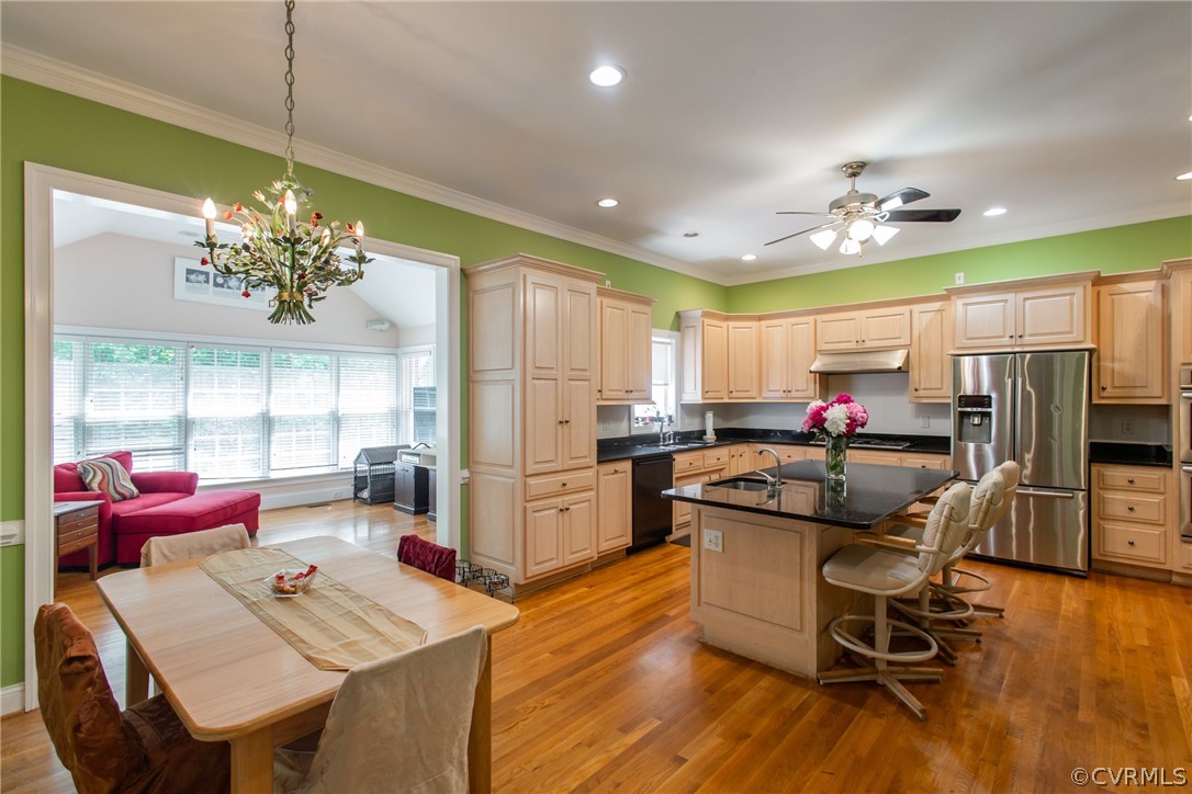 369 Hamlet Road Manakin-Sabot, VA 23103 - Photo 2 of 50 a kitchen that has a table chairs stainless steel appliances and cabinets