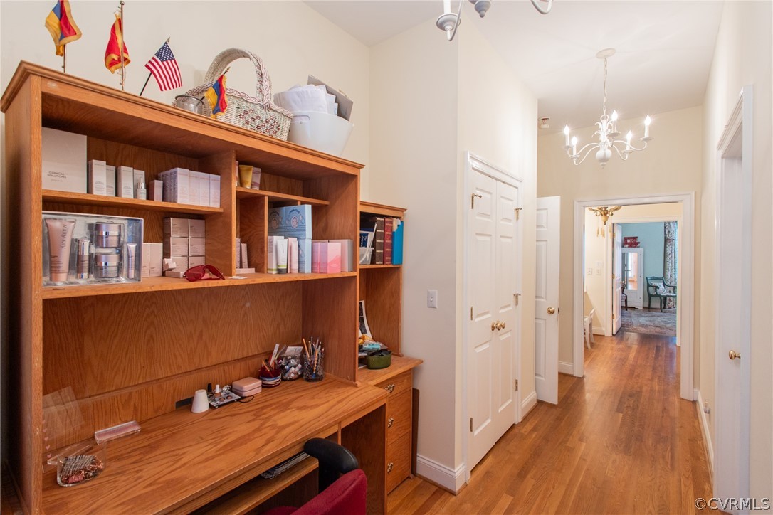 369 Hamlet Road Manakin-Sabot, VA 23103 - Photo 21 of 50 a view of a room with workspace and wooden floor