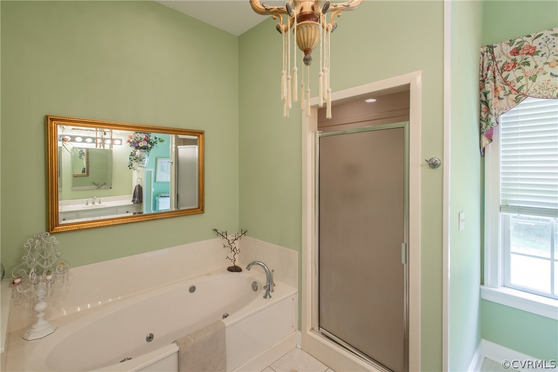 369 Hamlet Road Manakin-Sabot, VA 23103 - Photo 25 of 50 a bathroom with a bathtub and a shower
