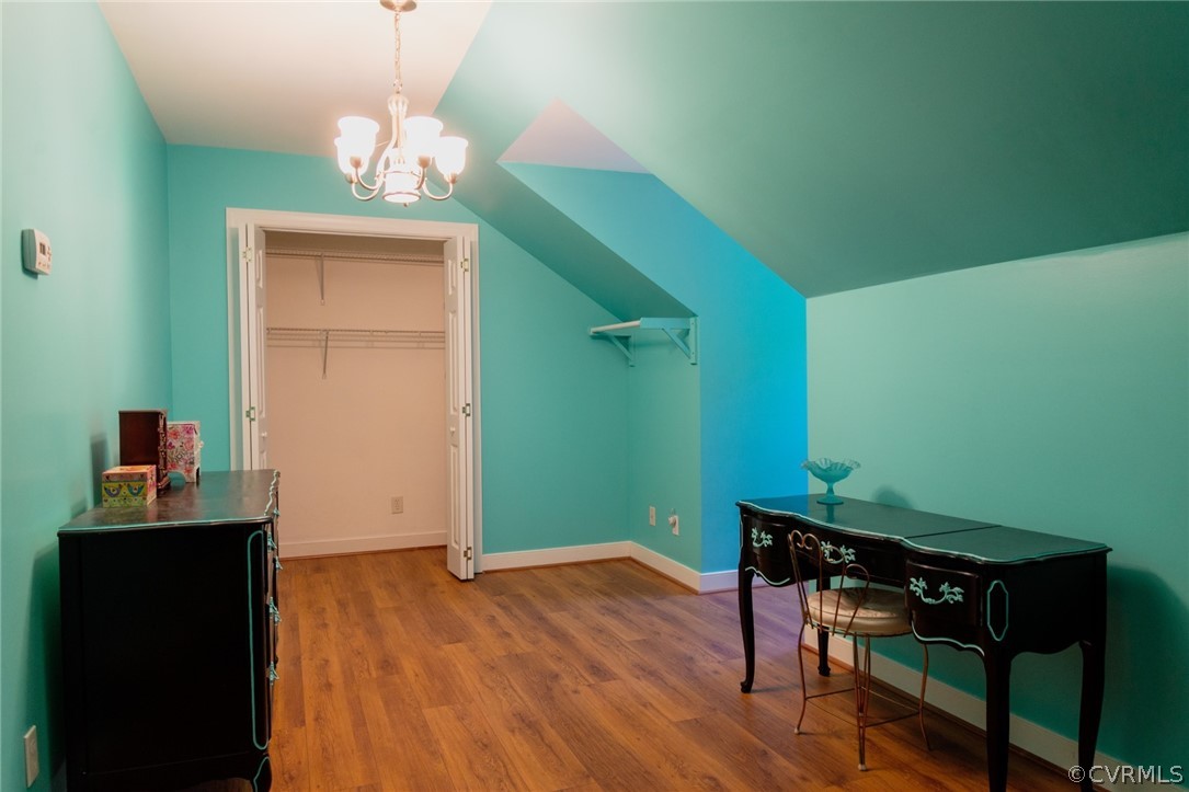 369 Hamlet Road Manakin-Sabot, VA 23103 - Photo 36 of 50 a room with furniture and a wooden floor