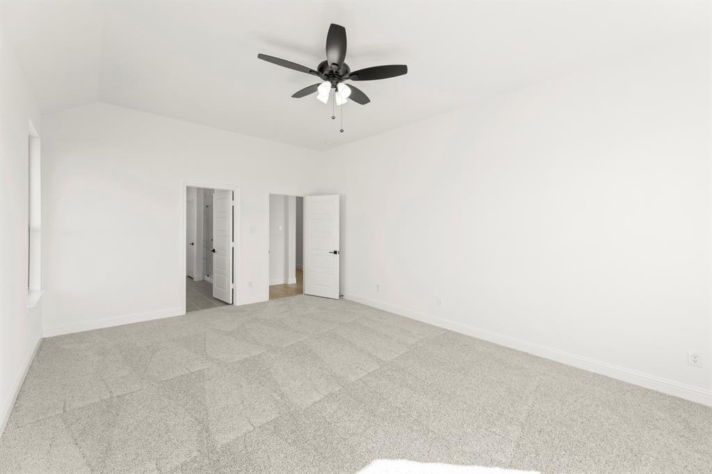610 Tenor Drive Forney, TX 75126 - Photo 11 of 30 a view of a livingroom with a ceiling fan and window