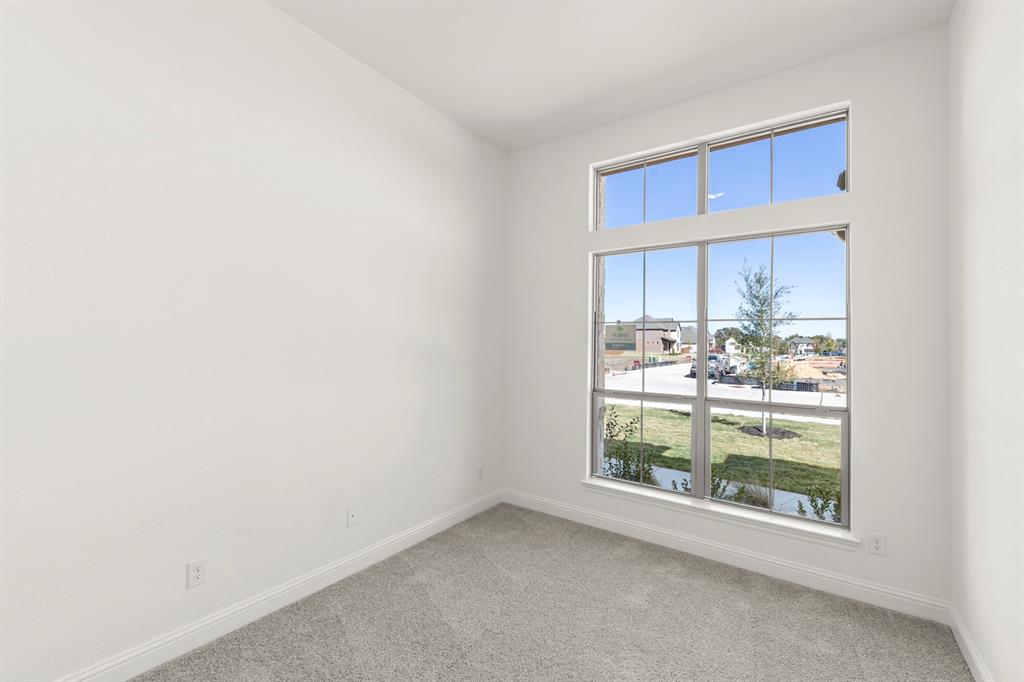610 Tenor Drive Forney, TX 75126 - Photo 19 of 30 a view of a window in a room