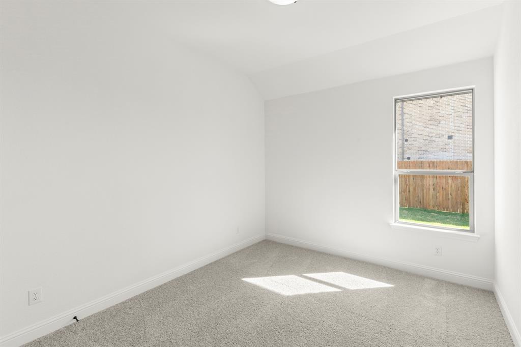 610 Tenor Drive Forney, TX 75126 - Photo 20 of 30 an empty room with a window