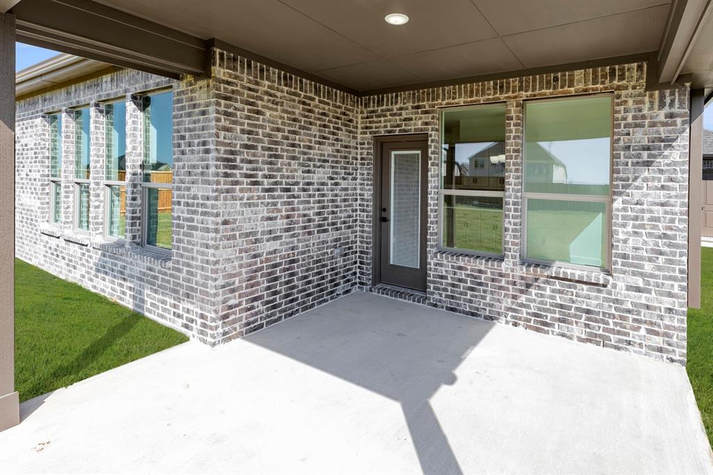 610 Tenor Drive Forney, TX 75126 - Photo 24 of 30 a bathroom with a shower