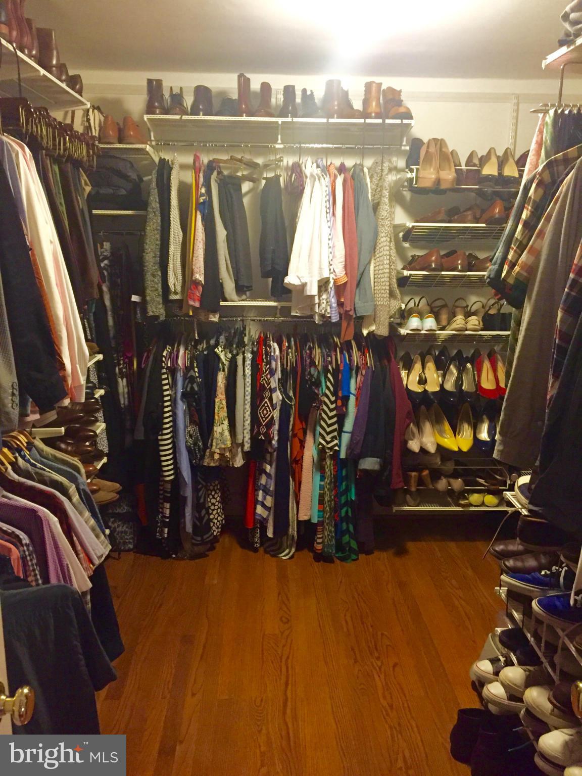 404 Russell Road Alexandria, VA 22301 - Photo 22 of 29 a view of walk in closet with clothes and shoes