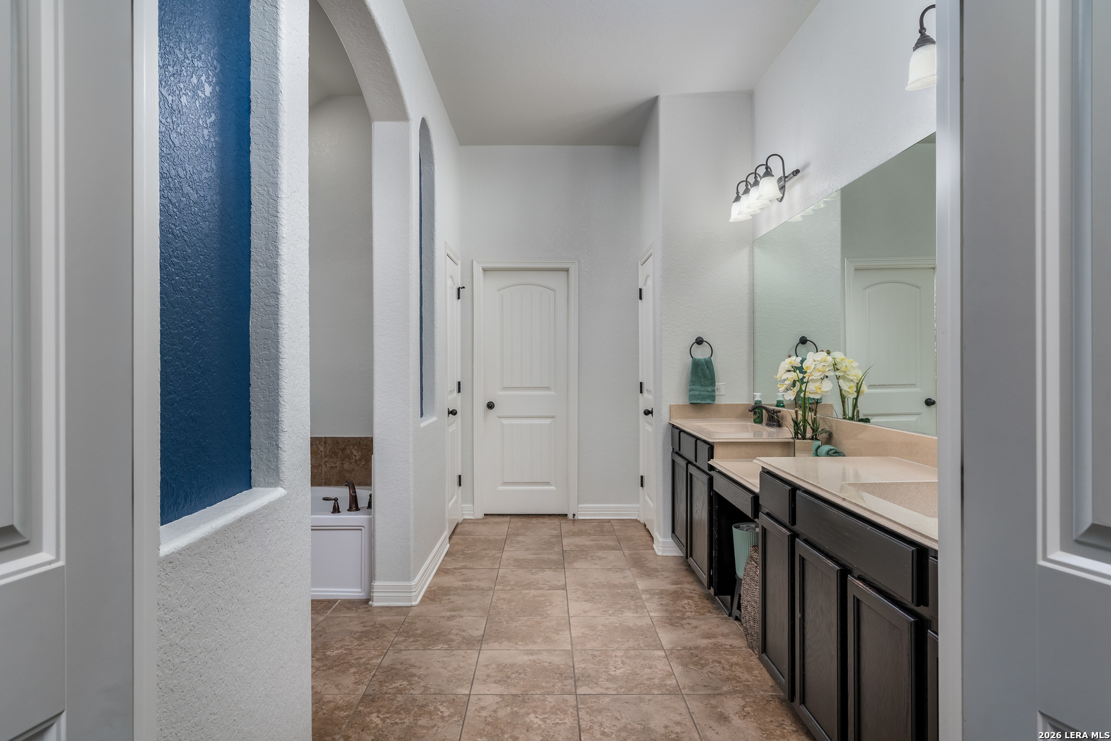 11331 Massive Mount Helotes, TX 78023 - Photo 18 of 43 a bathroom with a sink and a mirror