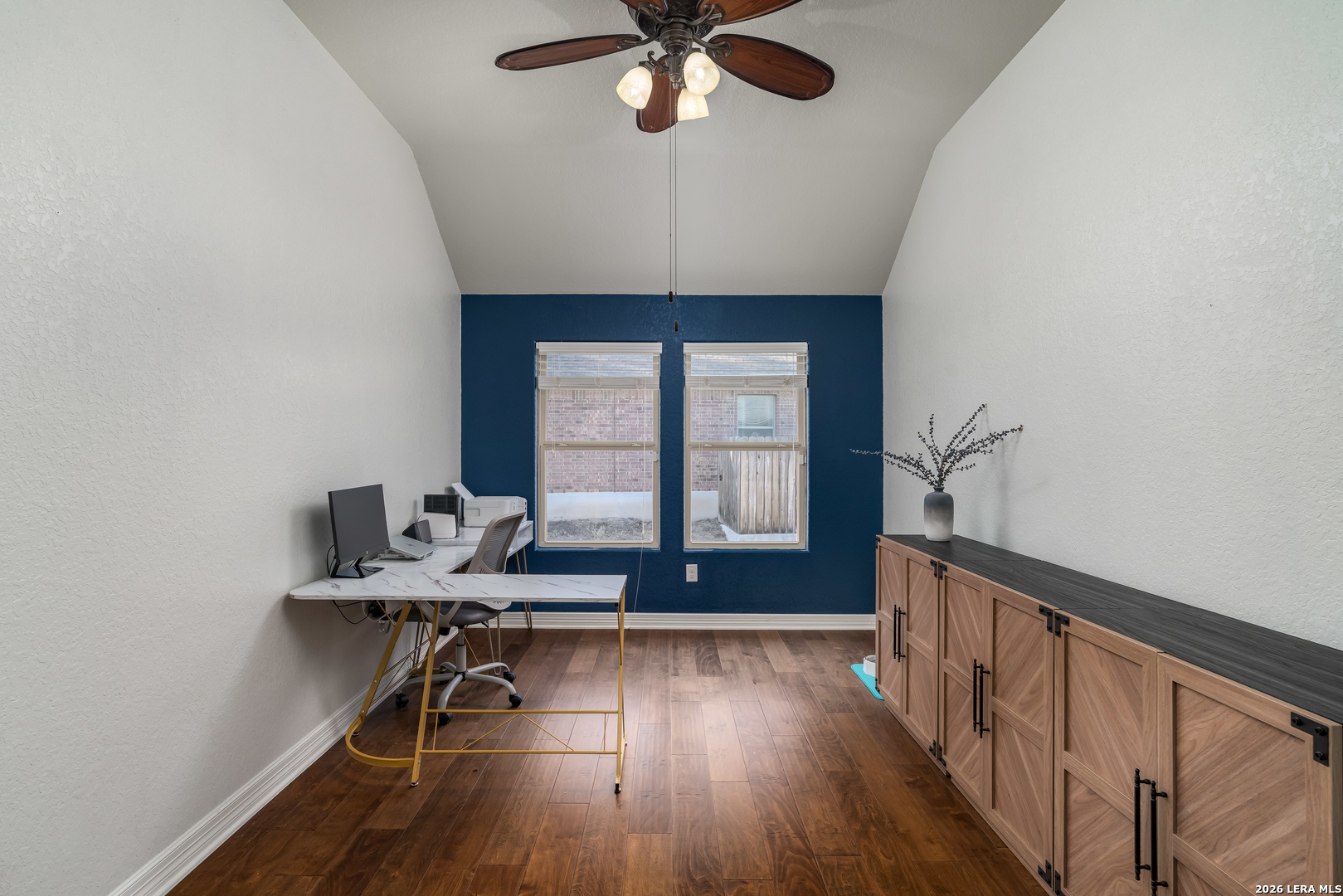 11331 Massive Mount Helotes, TX 78023 - Photo 25 of 43 a room with furniture window and wooden floor