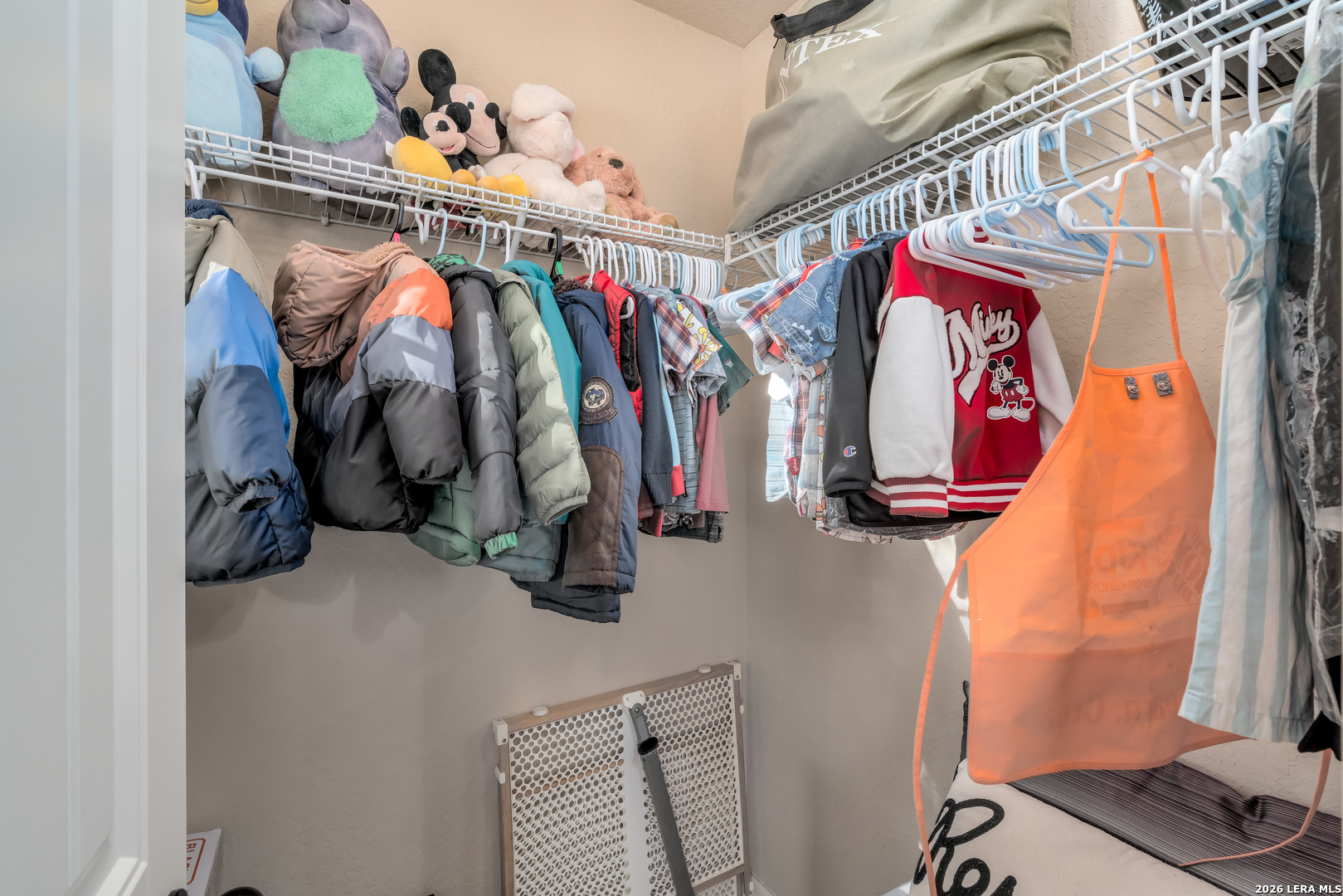 11331 Massive Mount Helotes, TX 78023 - Photo 28 of 43 a view of walk in closet with clothes and shoes