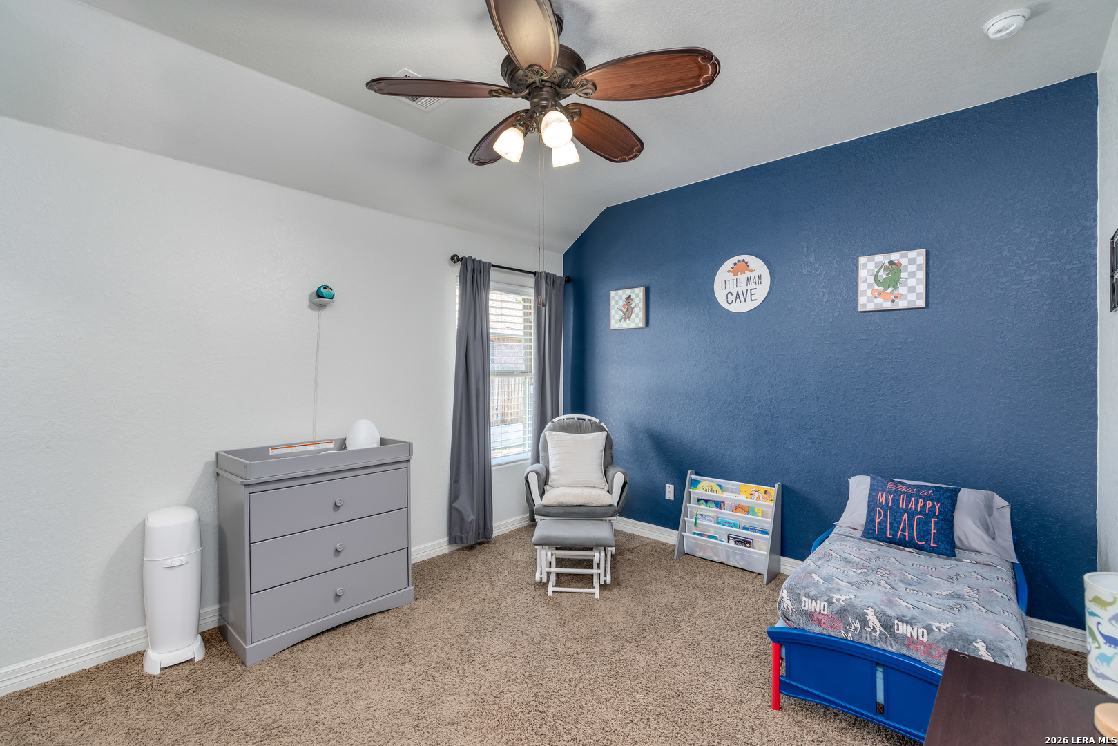 11331 Massive Mount Helotes, TX 78023 - Photo 30 of 43 a bedroom with furniture and a large window