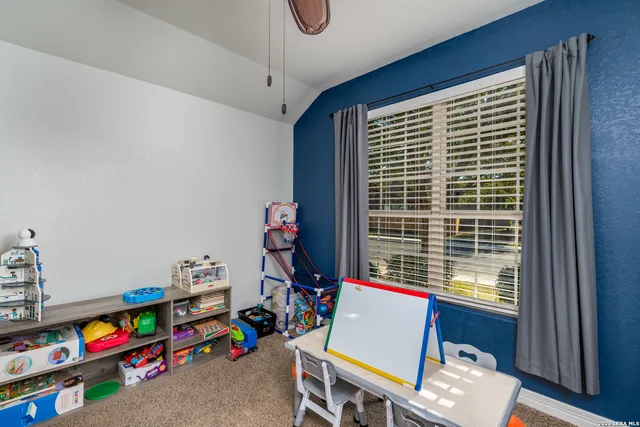 a room with furniture and a window