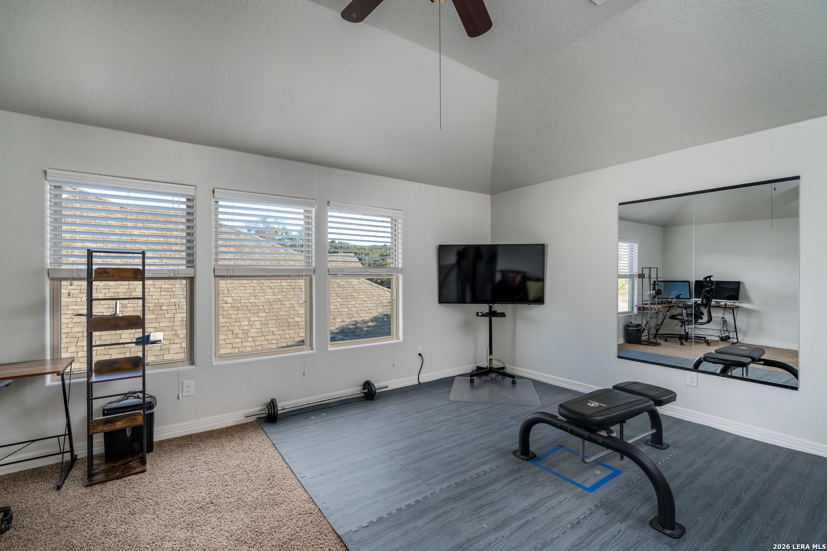 11331 Massive Mount Helotes, TX 78023 - Photo 34 of 43 a living room with furniture and a flat screen tv